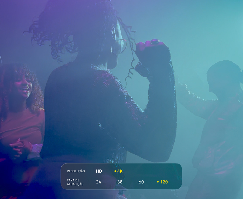 Gravação de pessoas dançando em condições de pouca luz para mostrar a capacidade de gravar em 4K Dolby Vision a 120 qps