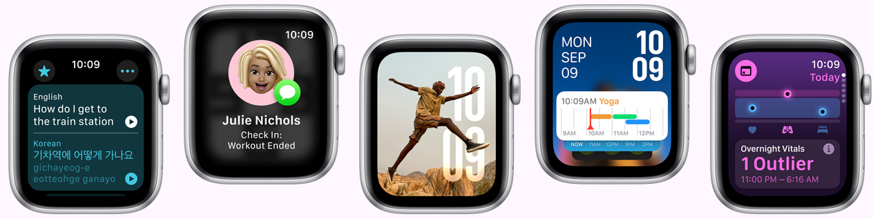 Multiple Apple Watch devices showing various watch face options