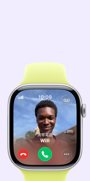 スペースグレイアルミニウムケースのApple Watch Series 11。着信中の画面に、連絡先の写真、電話に応答するボタンと拒否するボタンが表示されている。右側の外観にはDigital Crownが見えており、ネオンイエローのスポーツバンドが取りつけられている