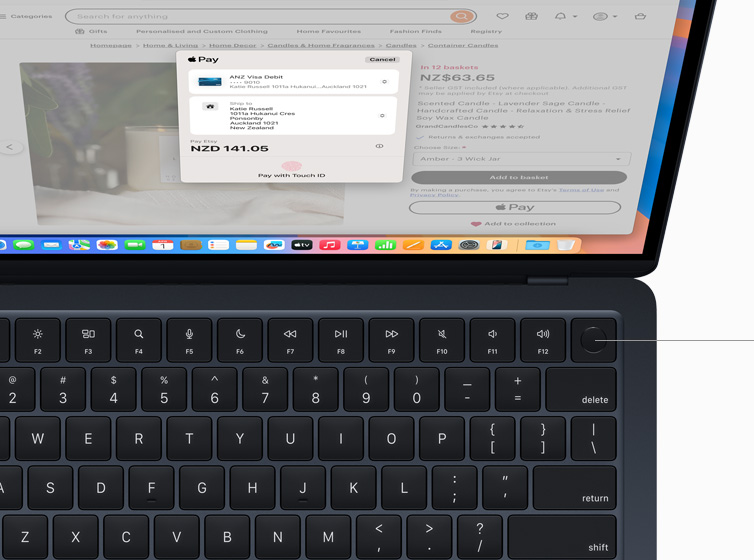 MacBook Air showing user authorising payment for online shopping purchase using Touch ID