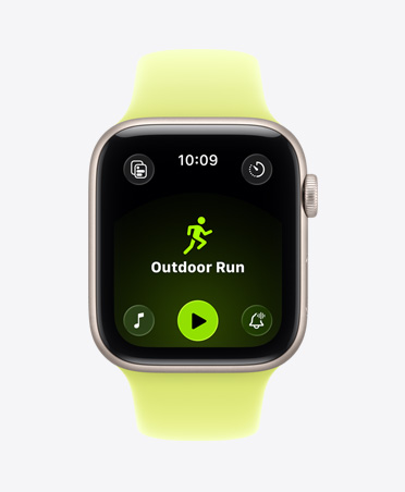 Apple Watch SE 3, alumiinikuori, värinä tähtivalkea, Ulkojuoksu-treeni avoinna, Apple Music ‑toistosäätimet näytön alareunassa, urheiluranneke, värinä neonkeltainen
