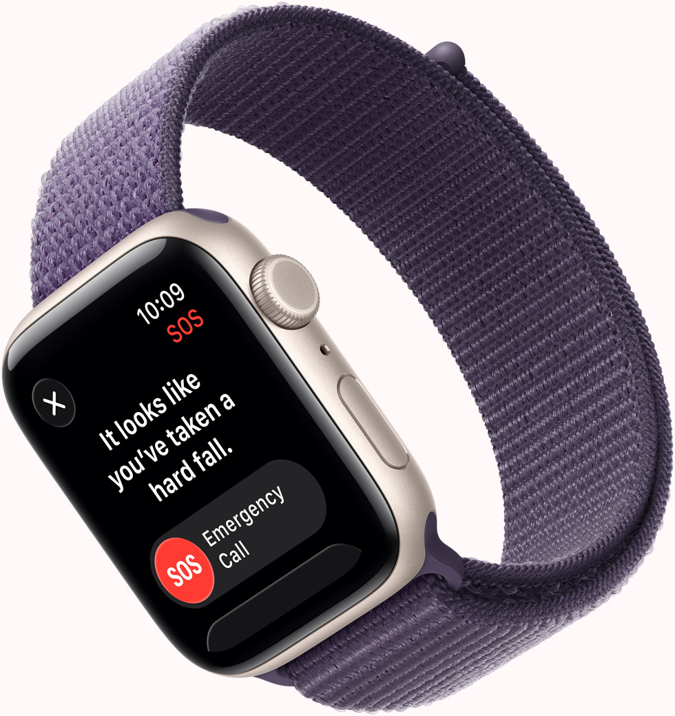 Apple Watch SE 3, alumiinikuori, värinä tähtivalkea, SOS kaatumisentunnistus ‑ilmoitus, hätäpuhelu- ja Olen OK ‑painikkeet, näkymä oikeasta sivusta, Digital Crown, mikrofoni, sivupainike, ranneke, Sport Loop, värinä usvanvioletti