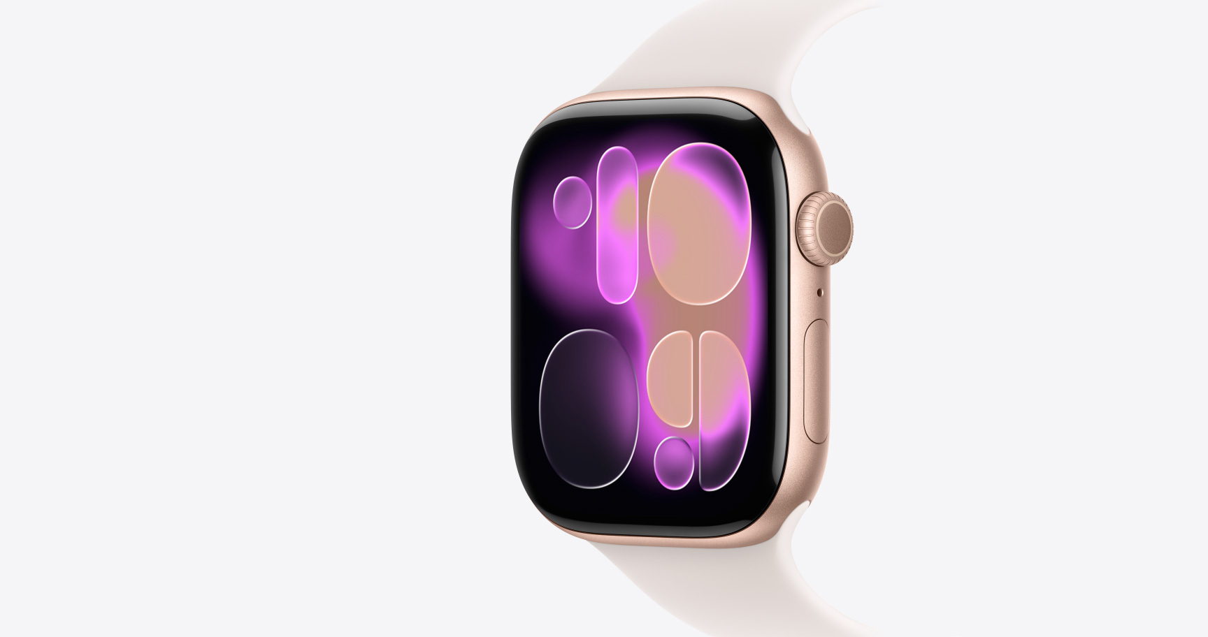 Apple Watch Series 11, hliníkový kryt vo farbe ružové zlato, ciferník Responsive Art, pohľad zvonku na pravú stranu, korunka Digital Crown, mikrofón, bočné tlačidlo, ružovkastý športový remienok