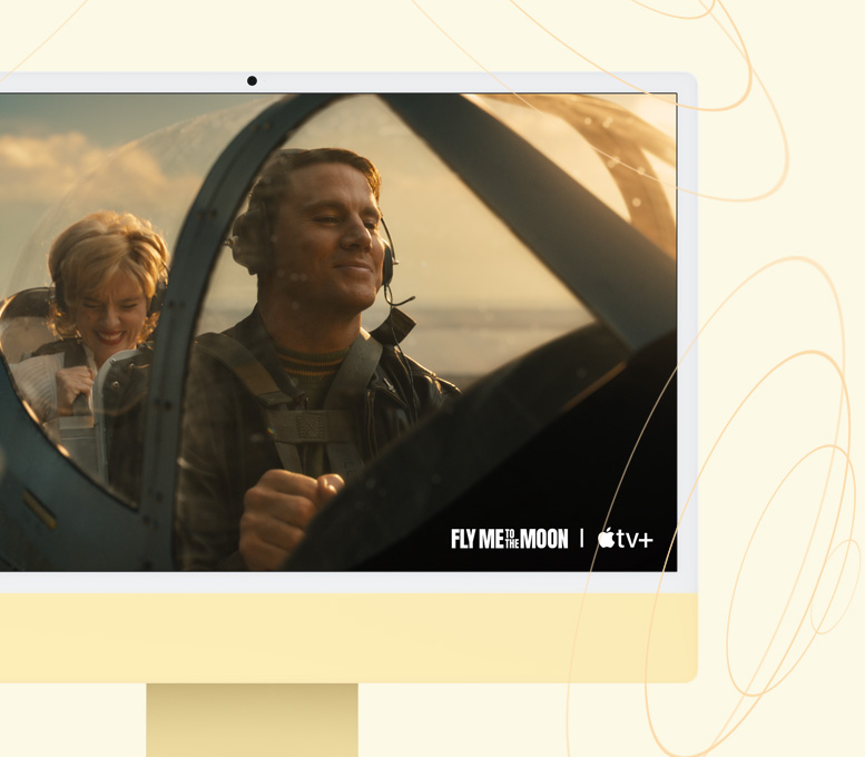 iMac باللون الأصفر. شاشة تعرض برنامجاً على تطبيق +Apple&nbsp;TV