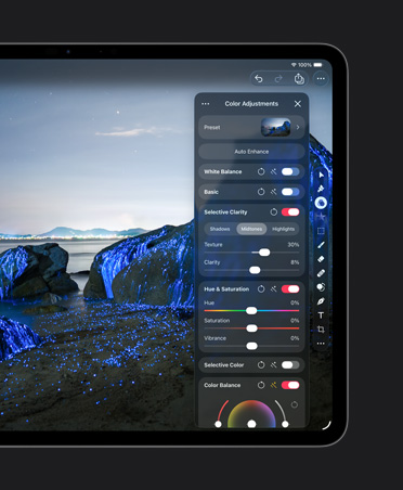 iPad Pro 13 screen, photo of boulders on beach with blue glows, colour adjustments tools